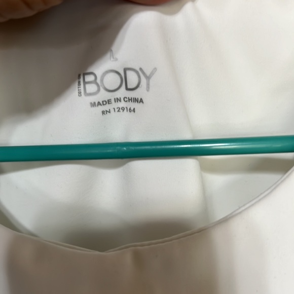 NWT tank sports bra - has a little bit of makeup in front - Picture 2 of 3